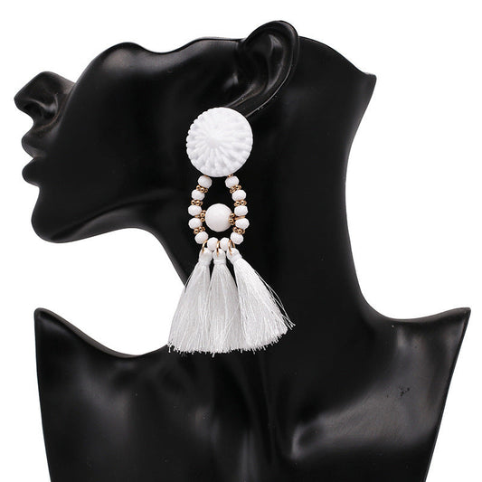 Bold Boho Tassel Earrings with Beaded Accents