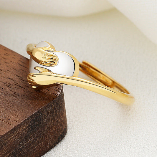 Embrace Hands Ring – Gold & Silver Tone Open Band