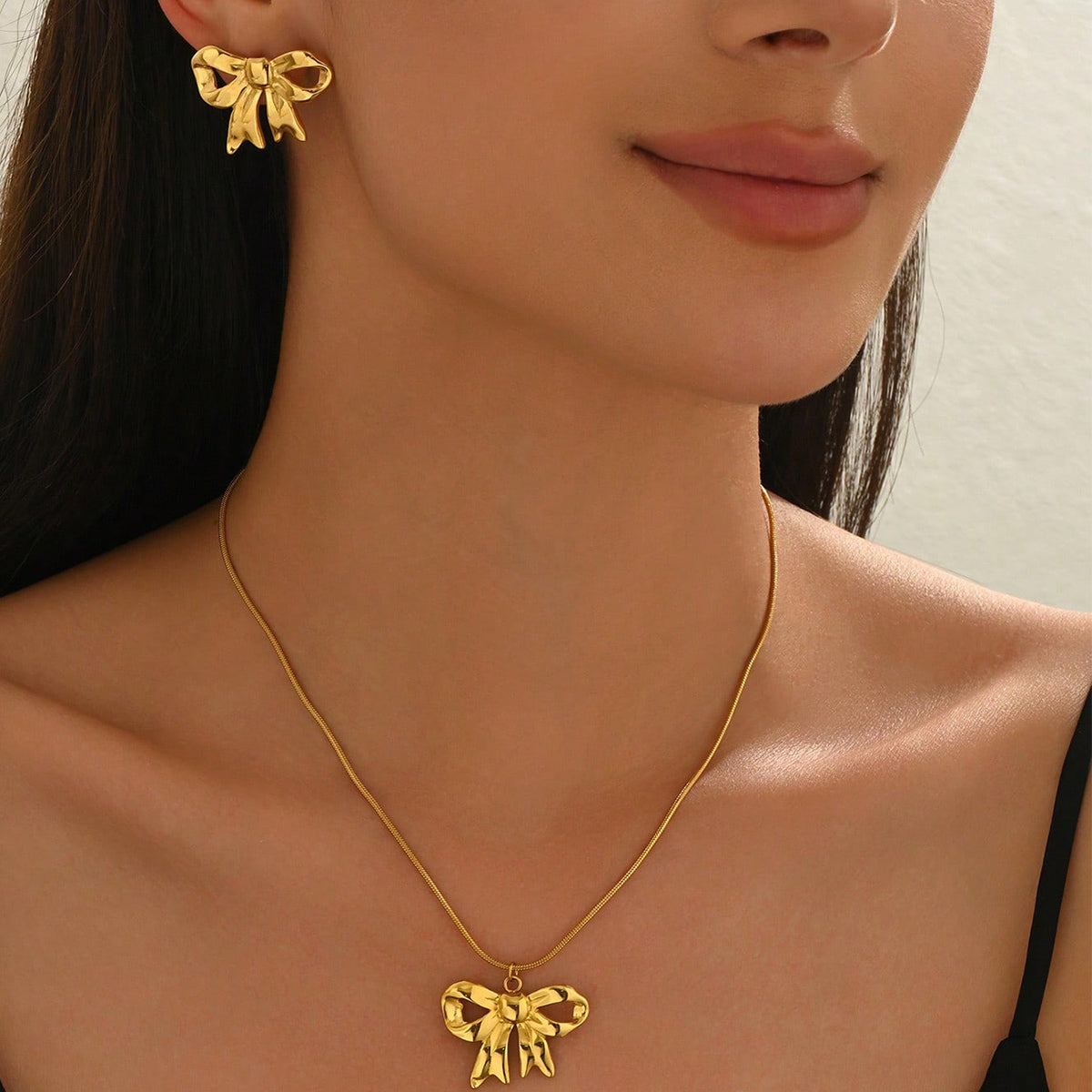 Elegant Bow Pendant Necklace & Matching Stud Earrings