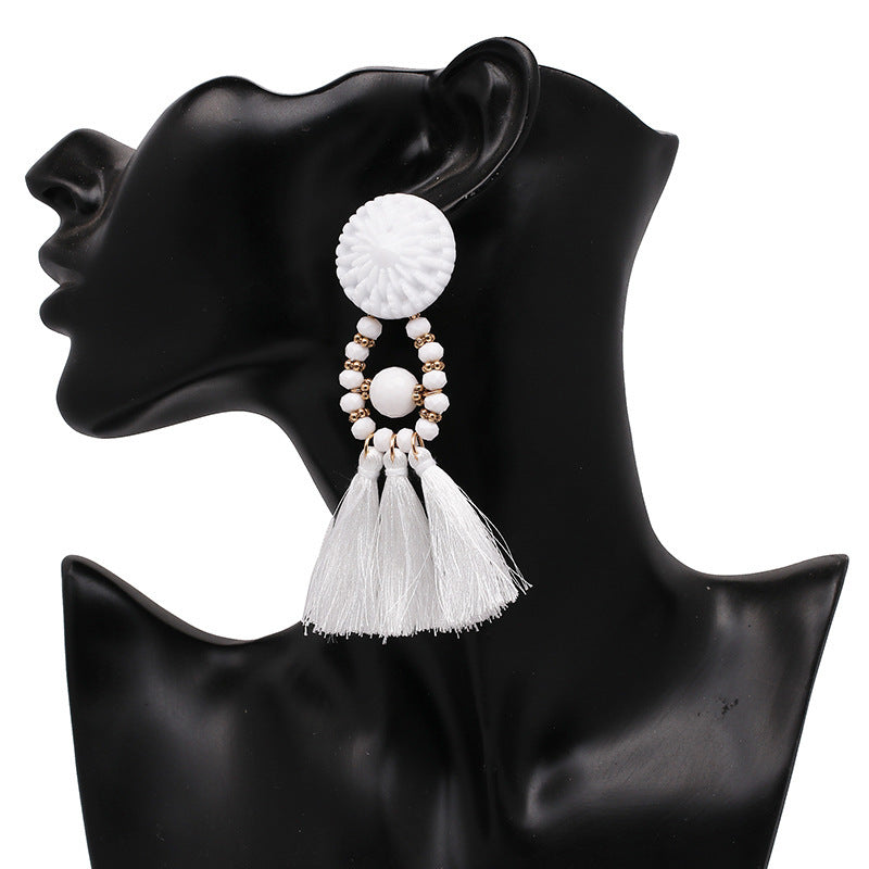 Bold Boho Tassel Earrings with Beaded Accents