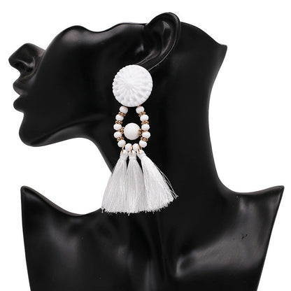Bold Boho Tassel Earrings with Beaded Accents