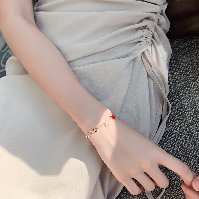 Delicate Chain Bracelet with Heart Charm Accents