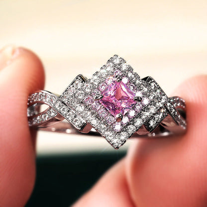 Princess-Cut Pink Halo Twist Ring in Sterling Silver