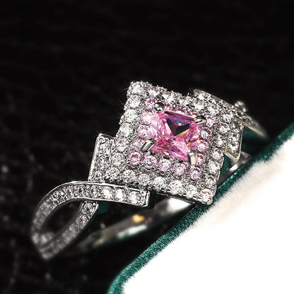 Princess-Cut Pink Halo Twist Ring in Sterling Silver