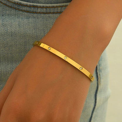 Minimalist Gold-Tone Bangle Bracelet with Crystal Accents