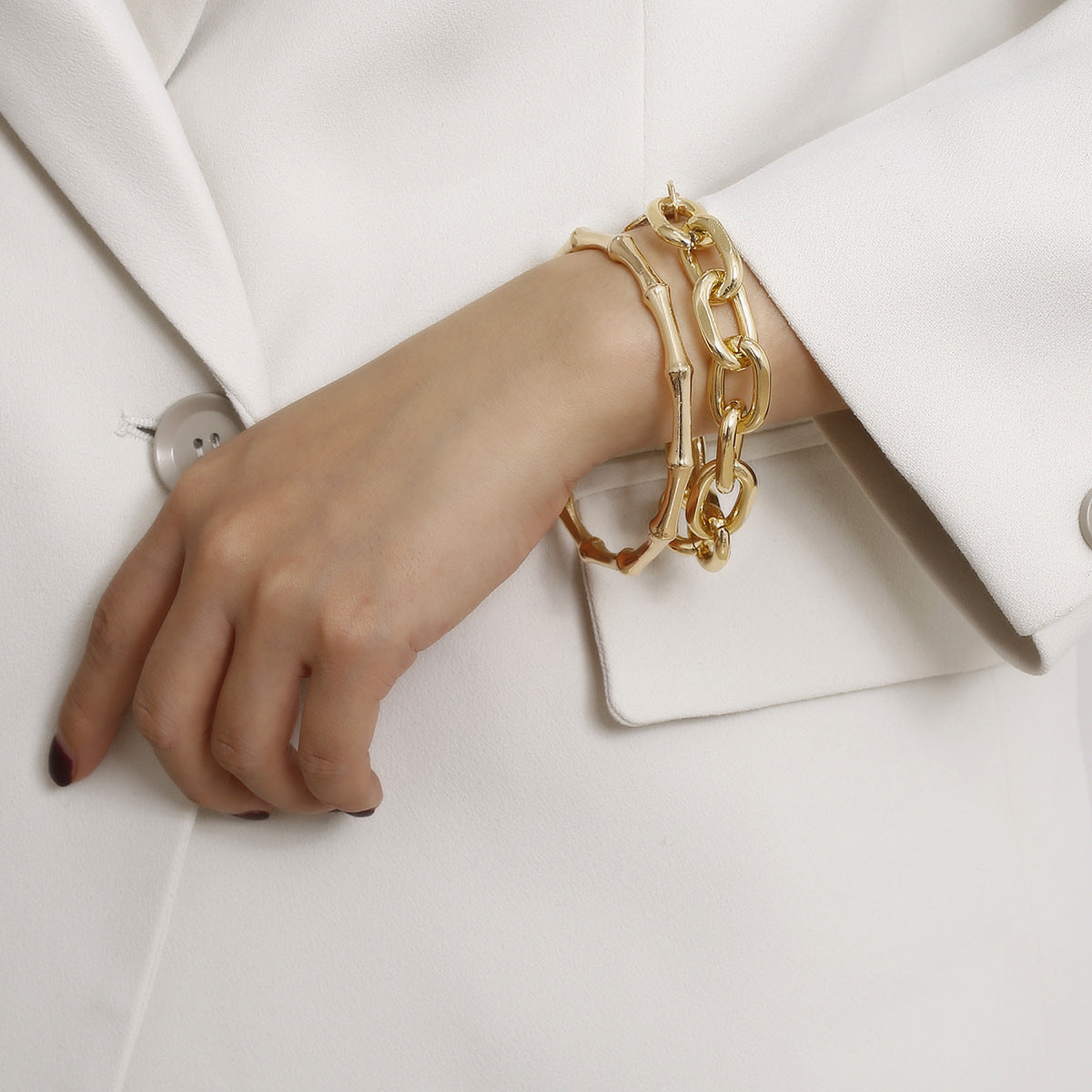 Two-Piece Bracelet Set with Organic Bangle and Chain Design