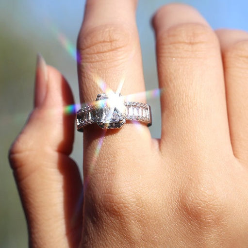 Emerald Cut Halo Engagement Ring with Baguette Accents