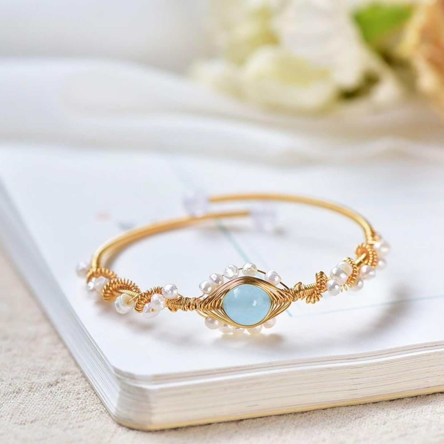 Elegant Pearl Cuff Bracelet with Center Gemstone Detail
