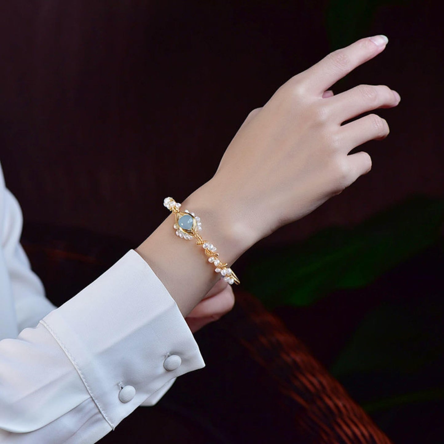 Elegant Pearl Cuff Bracelet with Center Gemstone Detail