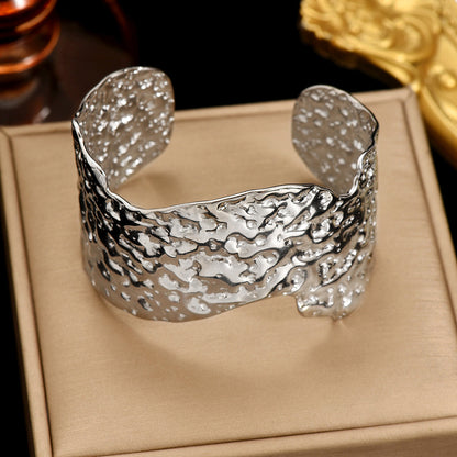 Sculptural Hammered Cuff Bracelet with Fluid Wave Design
