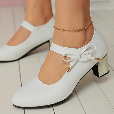 Chic Mid-Heel Buckle Pumps by Elizabeth Ainsley