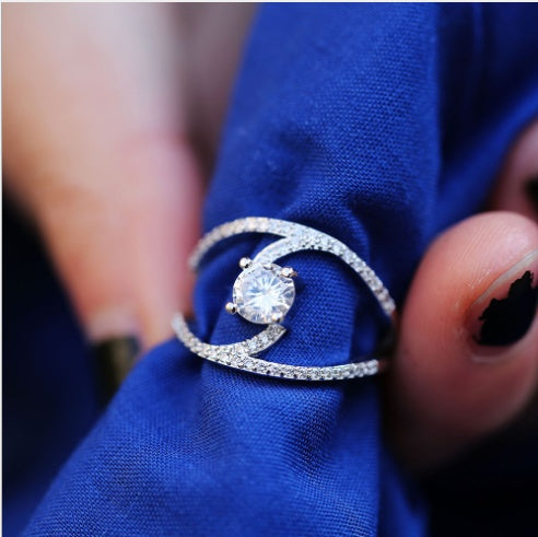 Infinity Sparkle Swirl Solitaire Ring