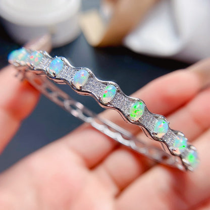 Oval Gem Detail Bangle Bracelet with Wave-Inspired Design