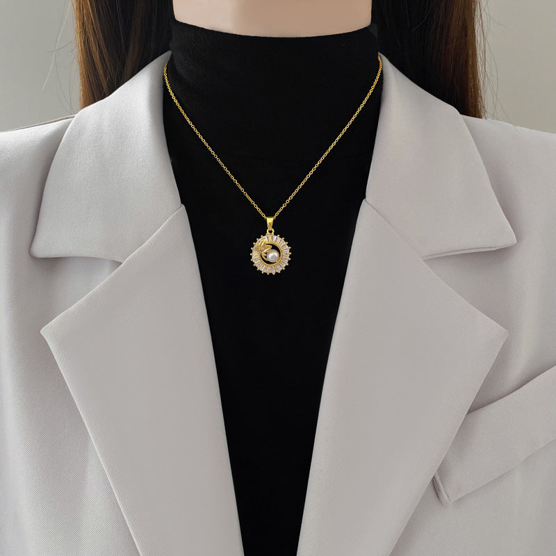 Gold Crystal Sun Pendant Necklace with Pearl Center