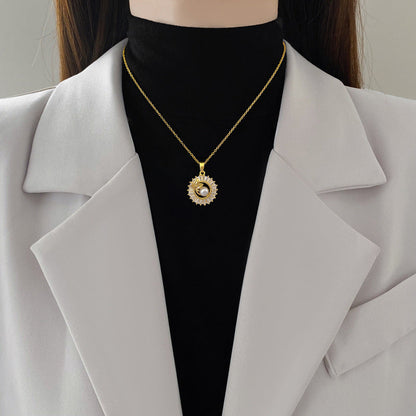 Gold Crystal Sun Pendant Necklace with Pearl Center