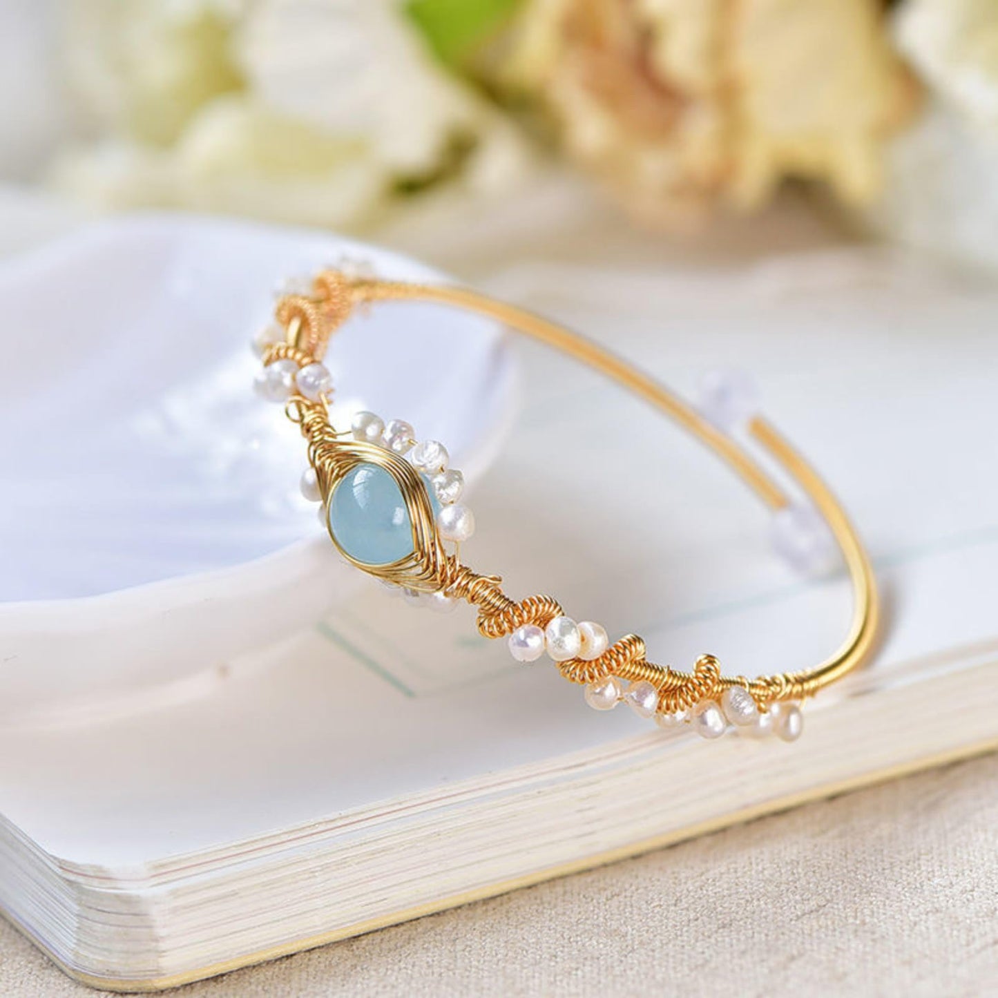 Elegant Pearl Cuff Bracelet with Center Gemstone Detail