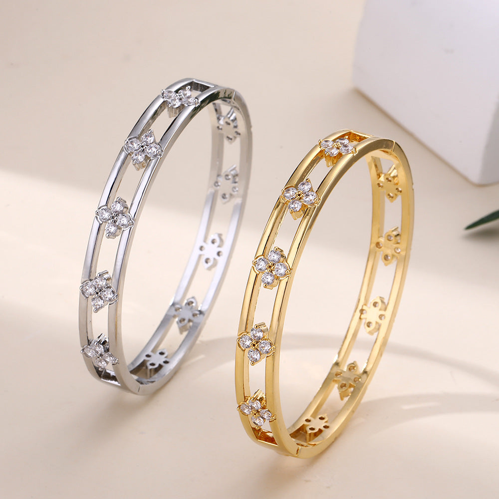 Floral Detail Bangle Bracelet with Elegant Openwork Design