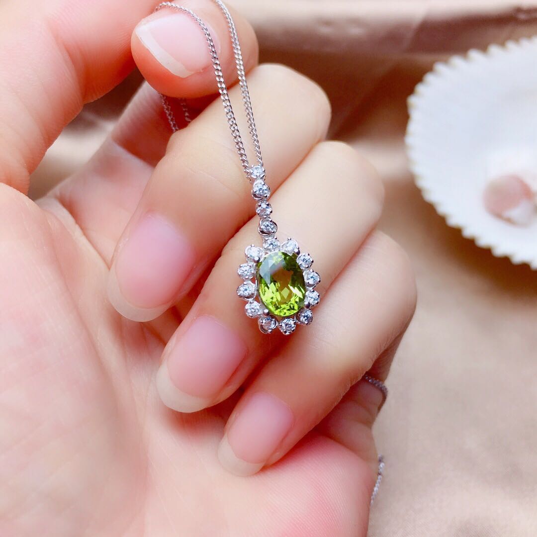 Olivine Crystal Pendant, Earrings & Ring with Sparkling Halo Design