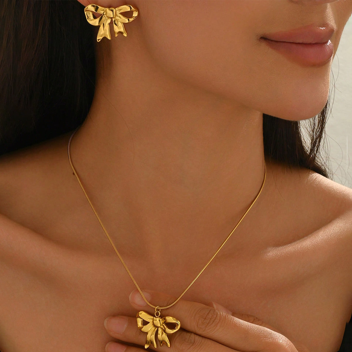 Elegant Bow Pendant Necklace & Matching Stud Earrings