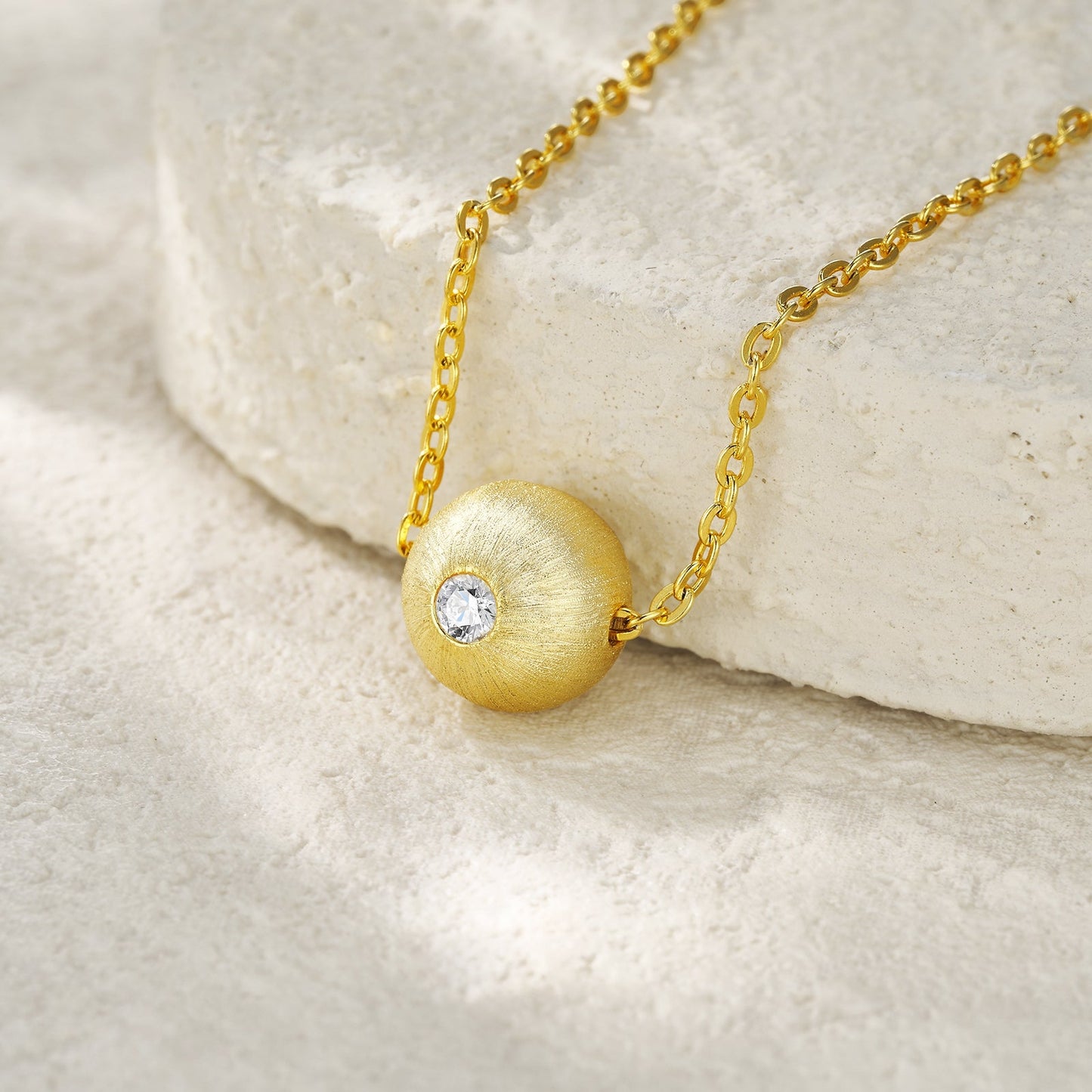 Elegant Necklace with Brushed Pendant & Sparkling Gemstone